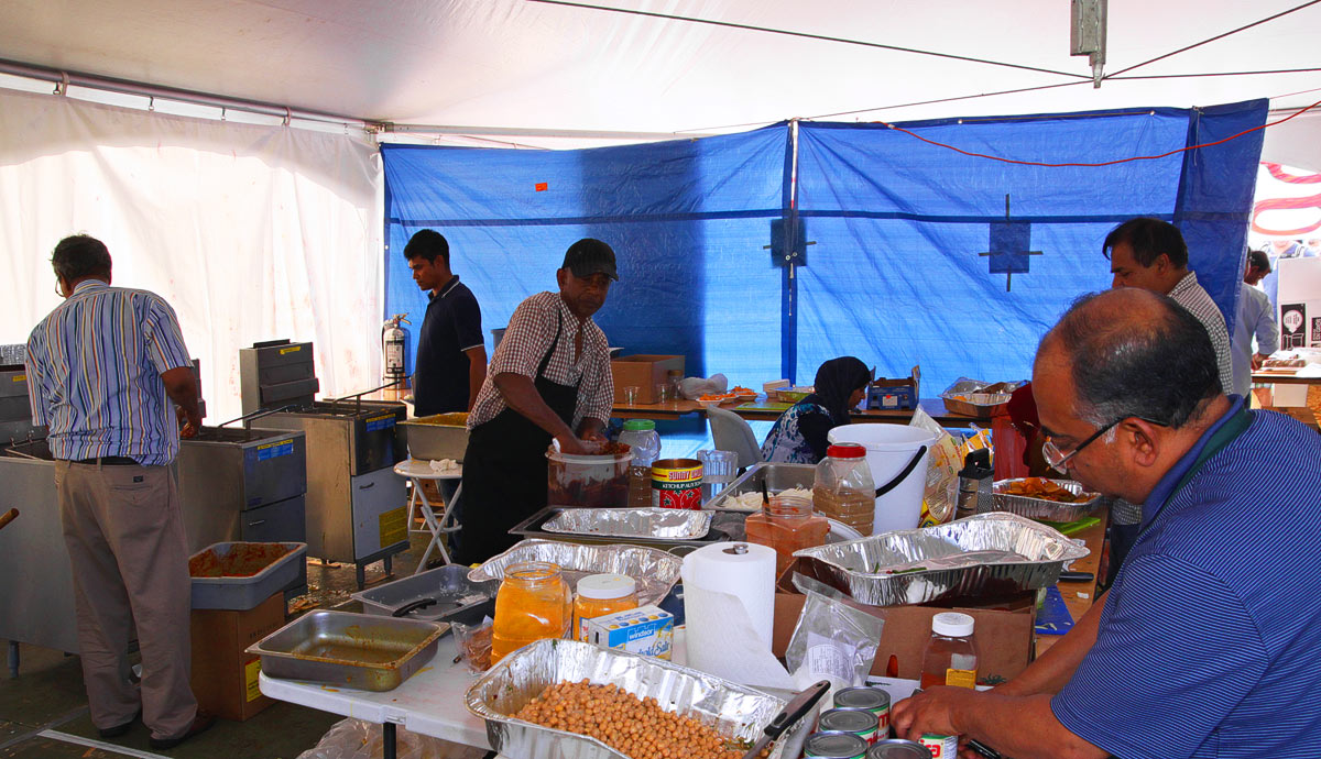 Preparations of food inside the Bangladesh Pavilion